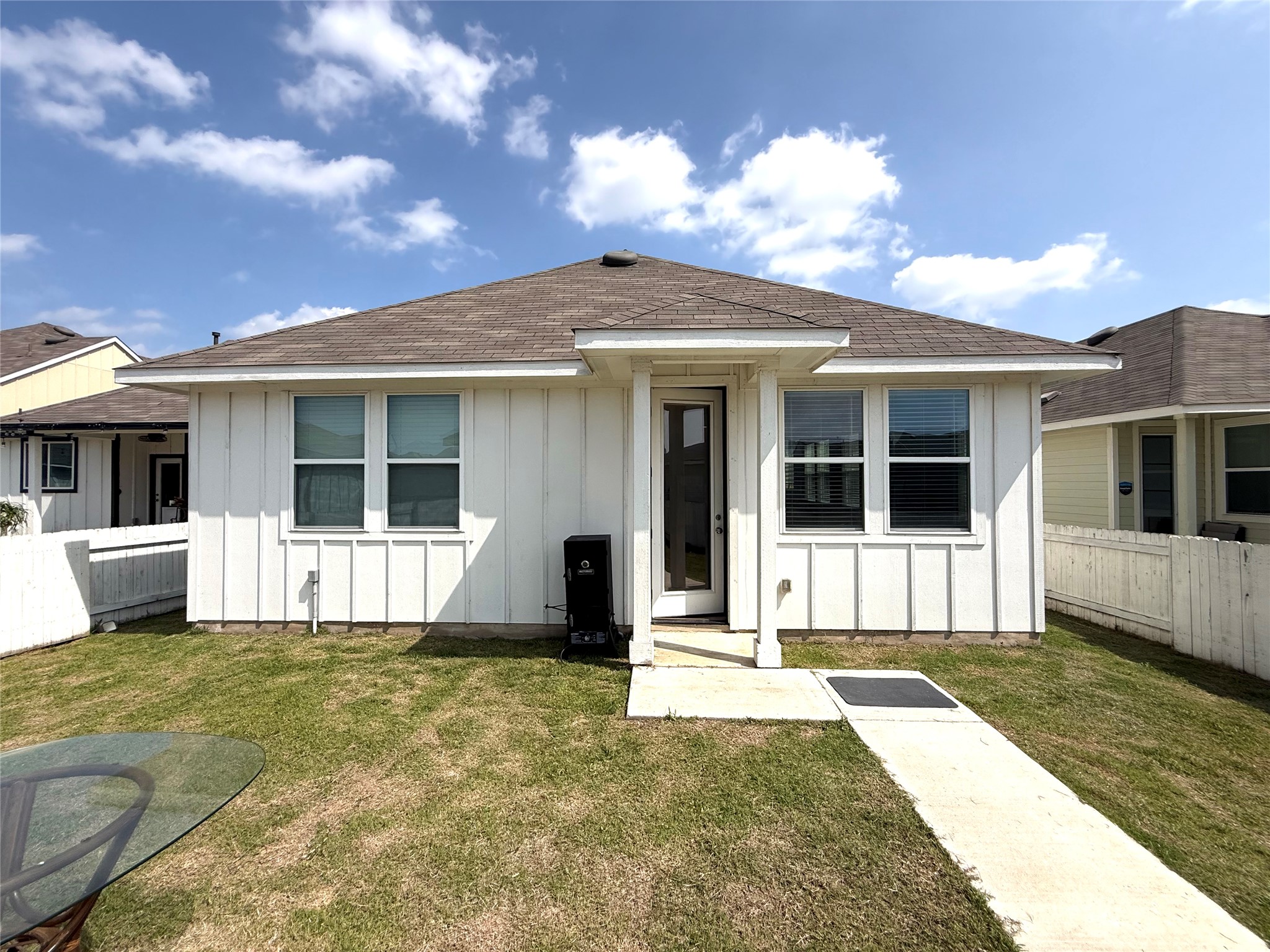 133 Fabion Street Kyle, TX 78640 - Photo 14 of 17 a house that has a large window in it