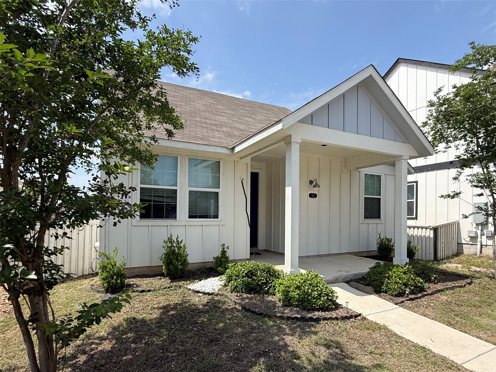 133 Fabion Street Kyle, TX 78640 - Photo 2 of 17 a view of a house with a yard