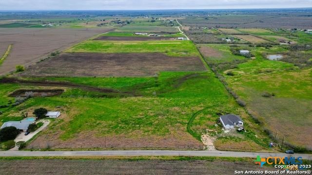 2395 Partnership Road Seguin, TX 78155 - Photo 14 of 17 a view of a lake with a big yard
