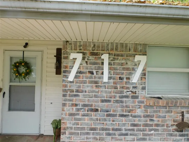 a bathroom with a shower and a mirror