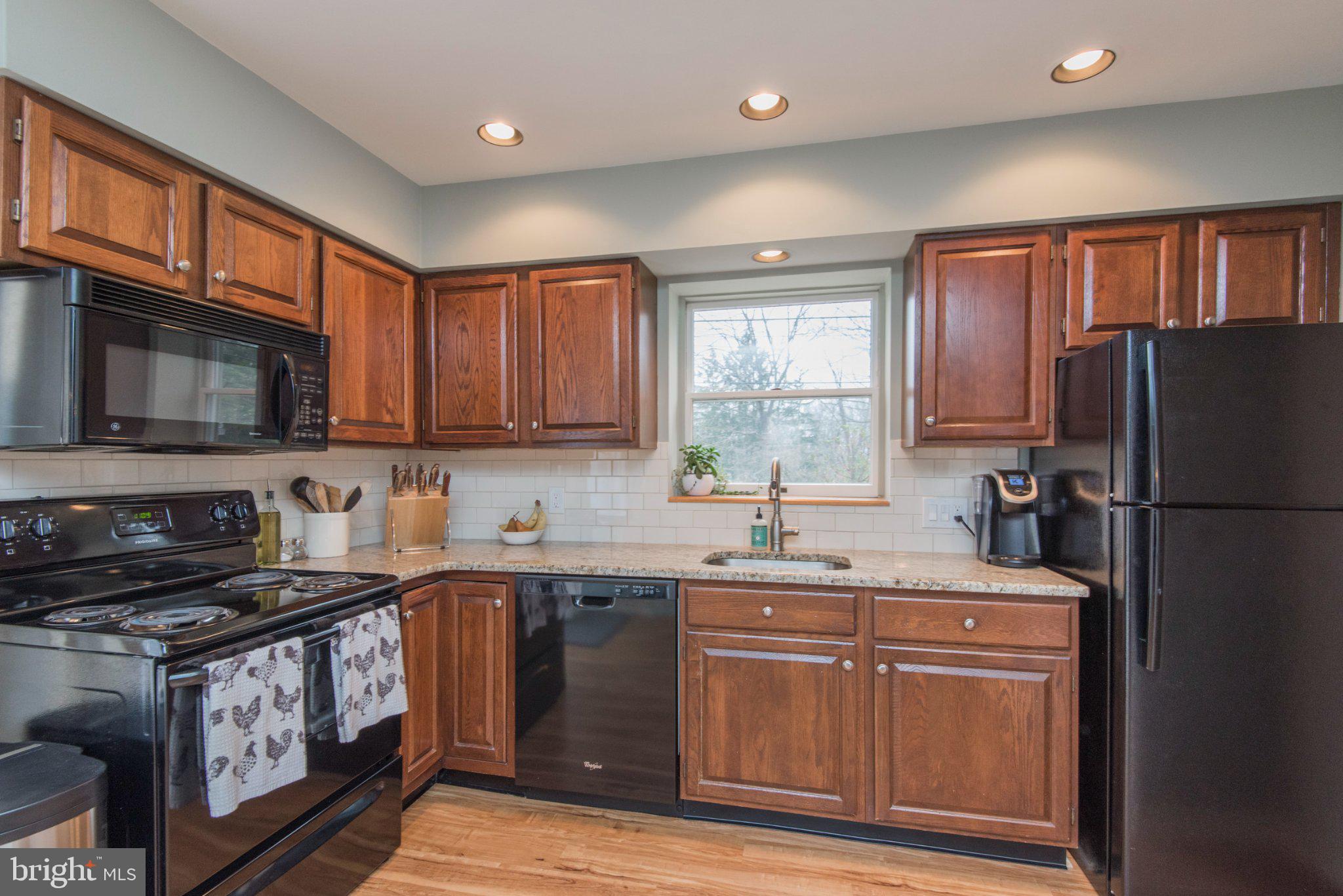 650 North Valley Forge Road Devon, PA 19333 - Photo 17 of 38 Warm wood tones in a cozy kitchen.