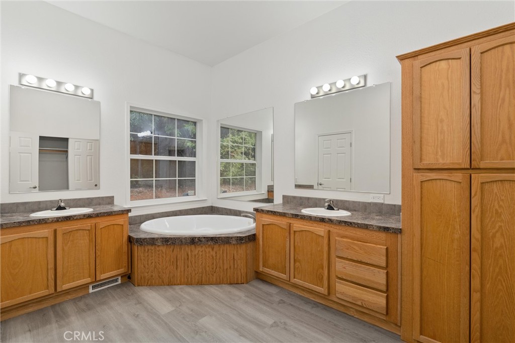 17 Weiss Hill Road Oroville, CA 95966 - Photo 26 of 35 a view of a kitchen with granite countertop window sink and cabinets