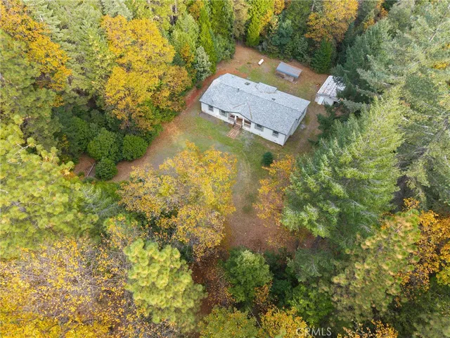 a front view of a house with yard