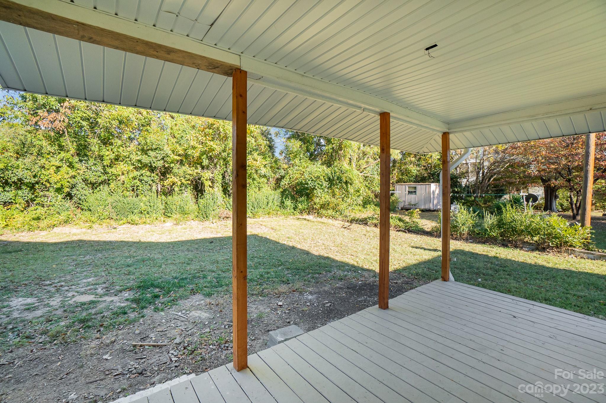 113 Brawley Street Chester, SC 29706 - Photo 12 of 29 a view of a porch with a yard