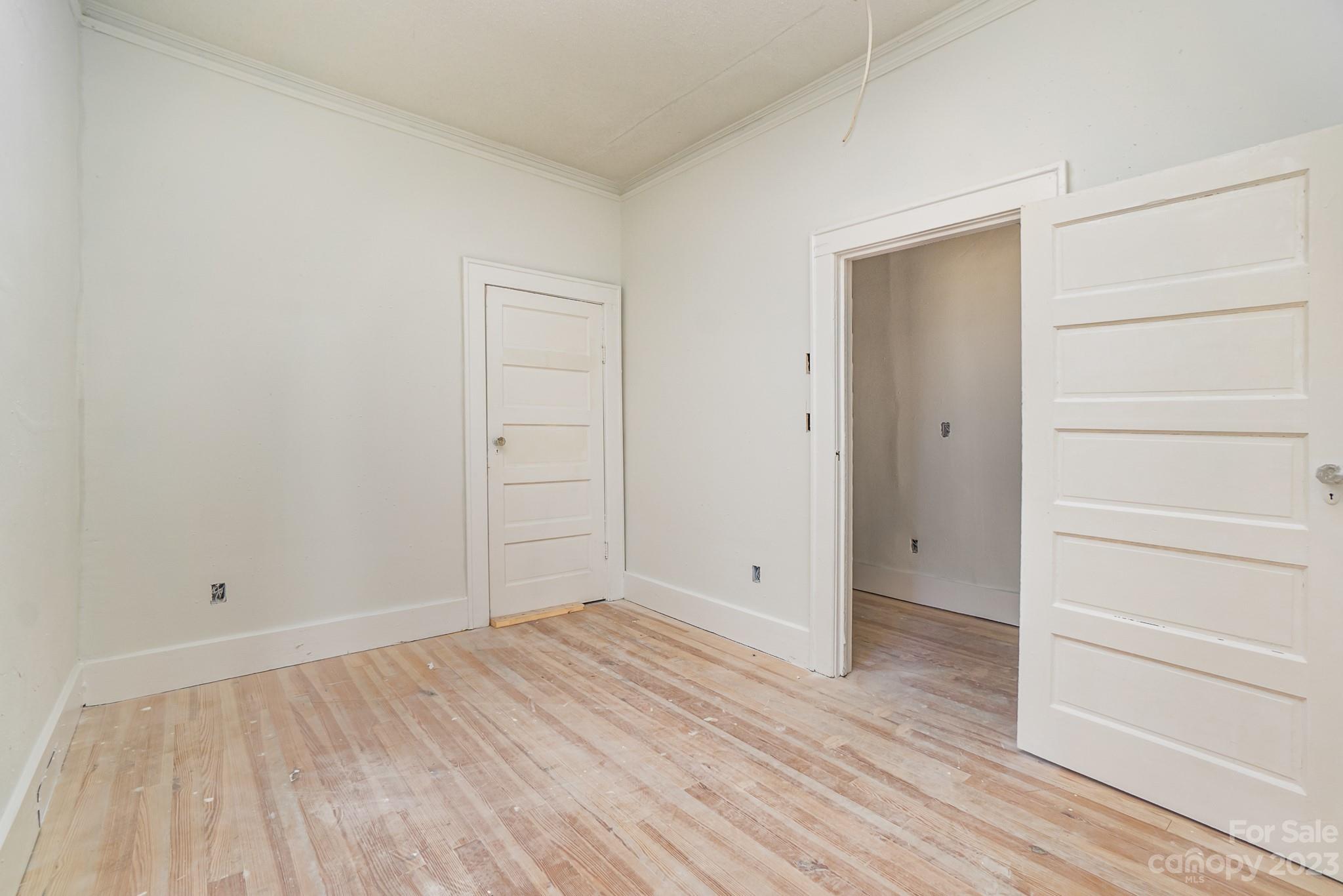 113 Brawley Street Chester, SC 29706 - Photo 20 of 29 wooden floor and closet in a room