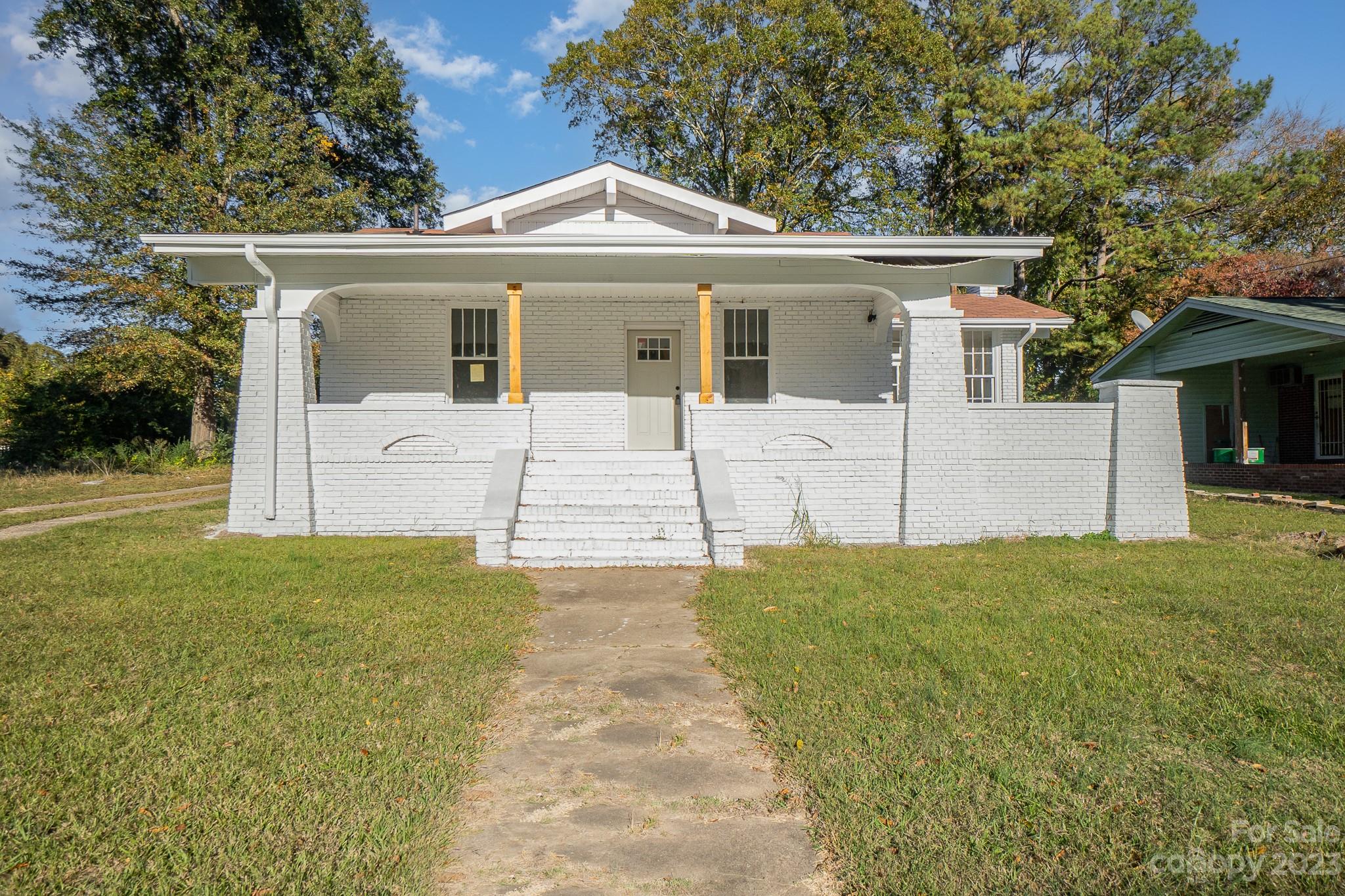 113 Brawley Street Chester, SC 29706 - Photo 2 of 29 a front view of a house with a yard
