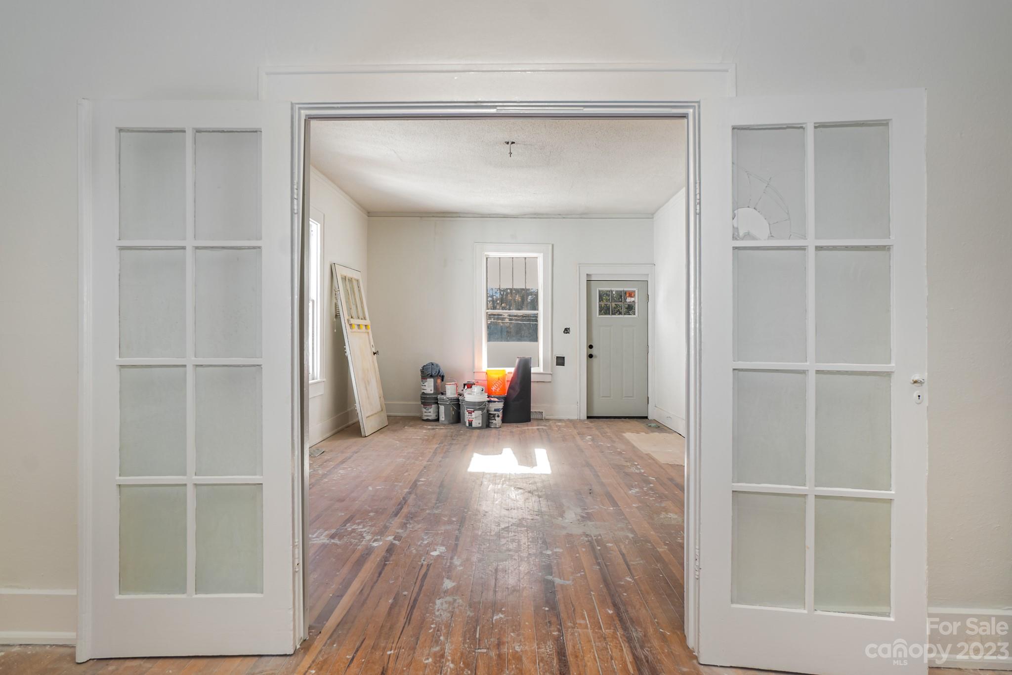 113 Brawley Street Chester, SC 29706 - Photo 25 of 29 a view of a livingroom with wooden floor and closet