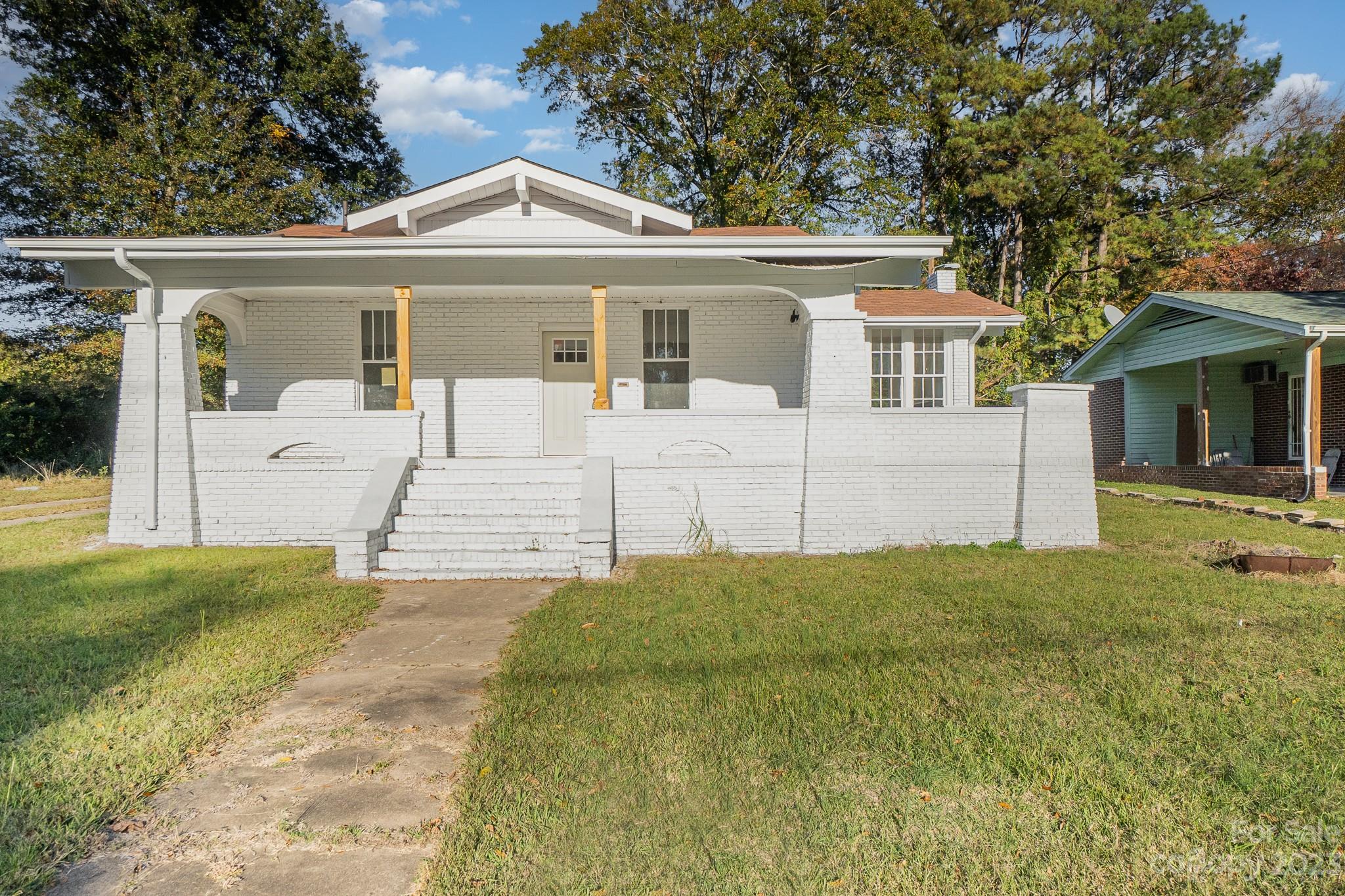 113 Brawley Street Chester, SC 29706 - Photo 28 of 29 a front view of a house with garden