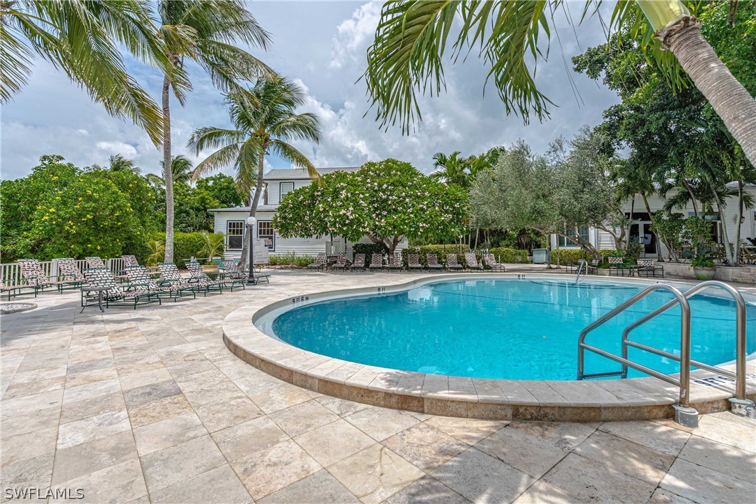 124 Useppa Island Bokeelia, FL 33922 - Photo 23 of 30 a view of outdoor space yard and swimming pool