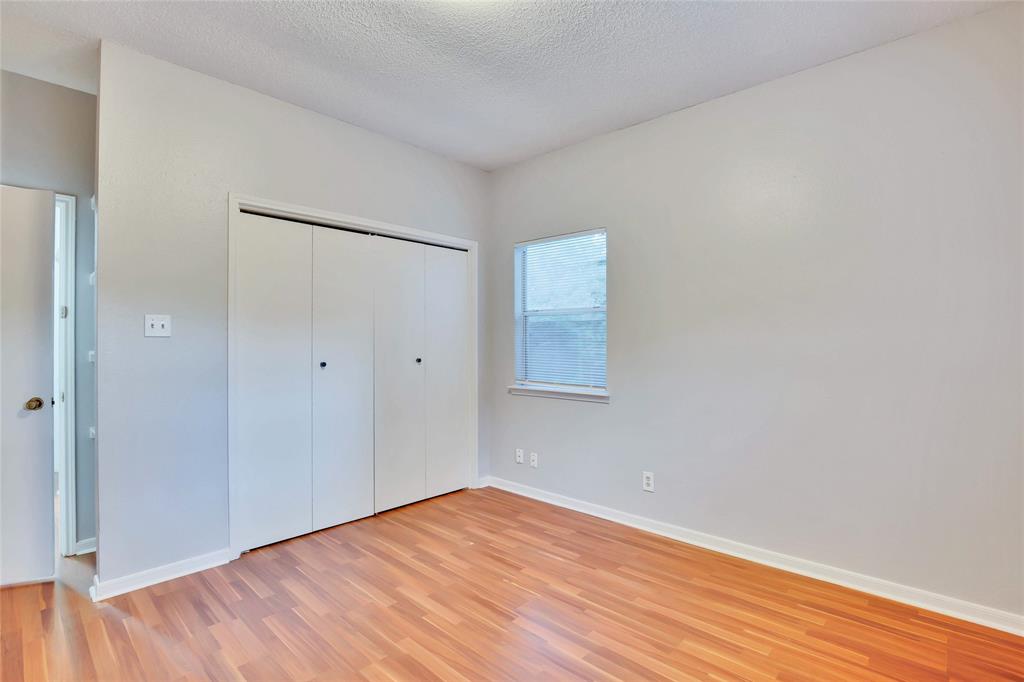 3113 Robinson Avenue, Unit B Austin, TX 78722 - Photo 12 of 16 a view of empty room with wooden floor