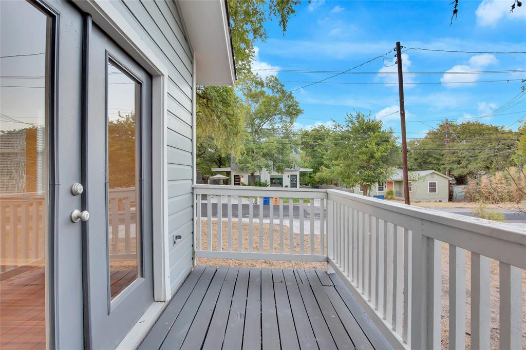 3113 Robinson Avenue, Unit B Austin, TX 78722 - Photo 7 of 16 a view of a balcony with wooden floor