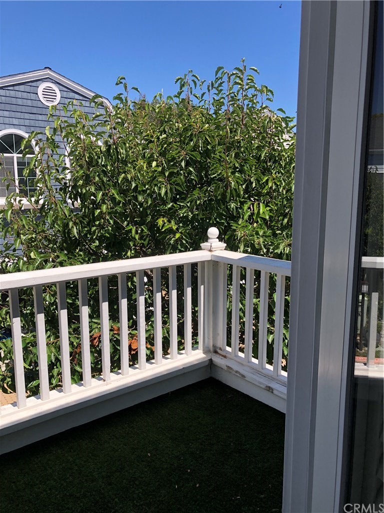 303 Canoe Pond Costa Mesa, CA 92627 - Photo 30 of 49 a view of a wooden fence