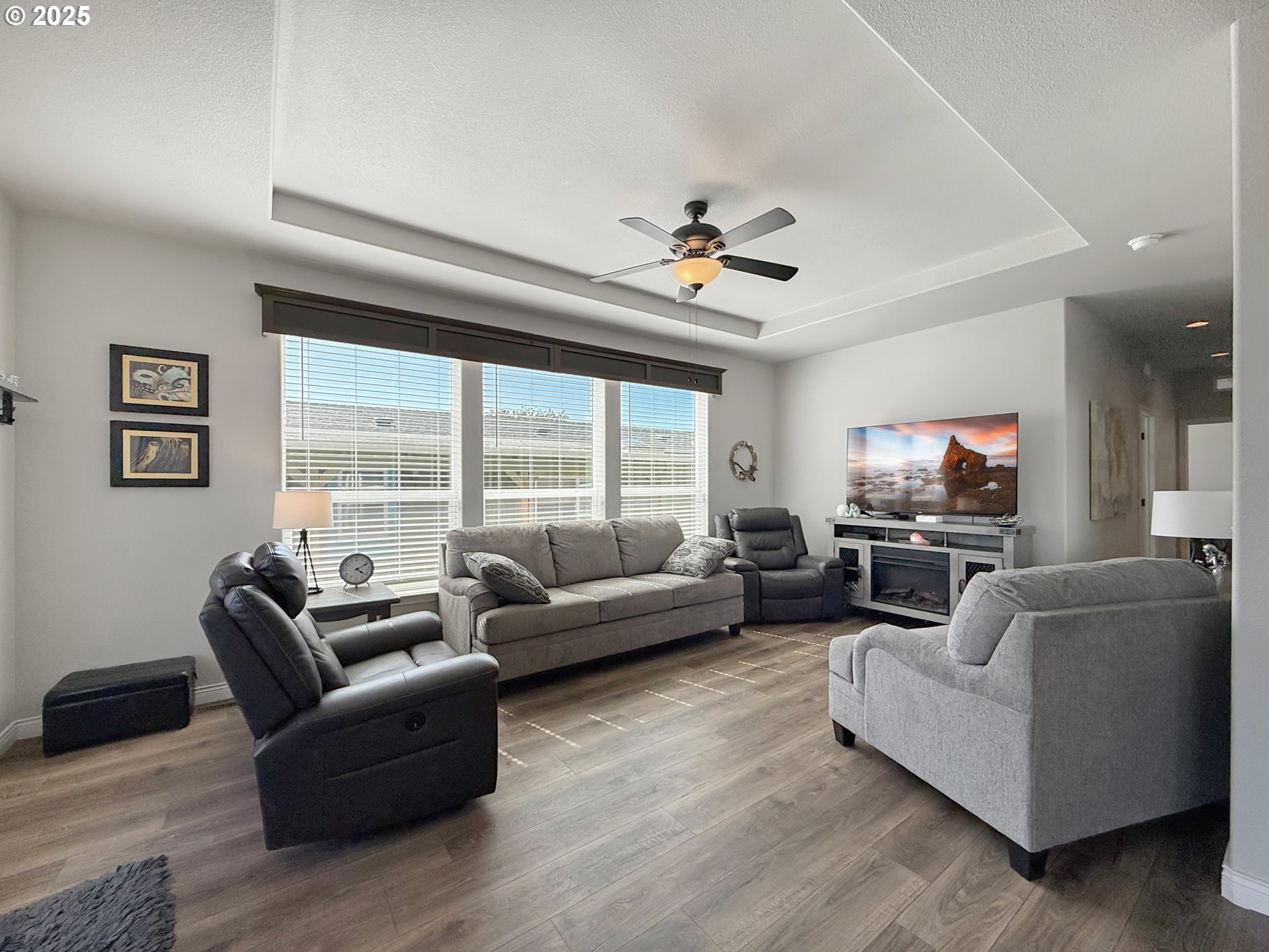 15889 Sunset Strip, Unit 44 Brookings, OR 97415 - Photo 13 of 44 a living room with furniture and a flat screen tv