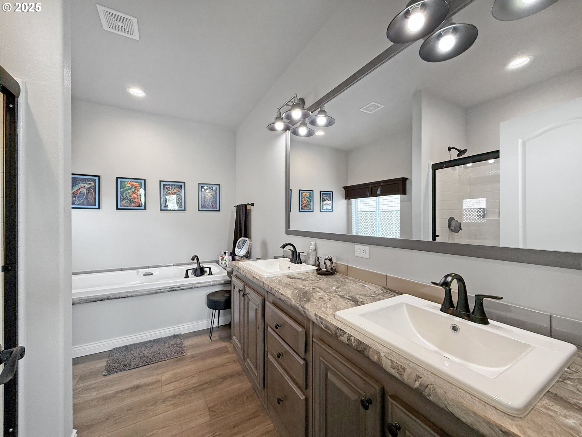 15889 Sunset Strip, Unit 44 Brookings, OR 97415 - Photo 17 of 44 a view of a bathroom sink mirror and vanity