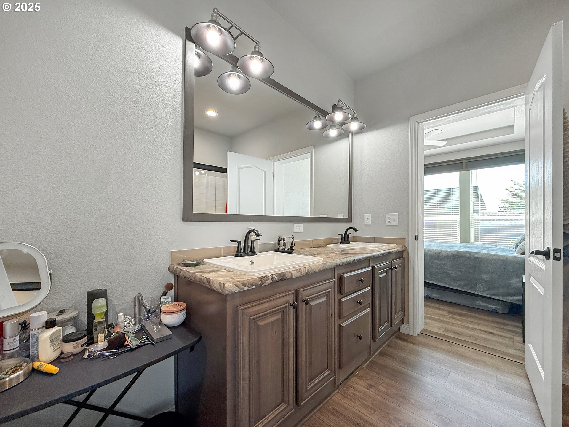 15889 Sunset Strip, Unit 44 Brookings, OR 97415 - Photo 19 of 44 a bathroom with a double vanity sink and a mirror