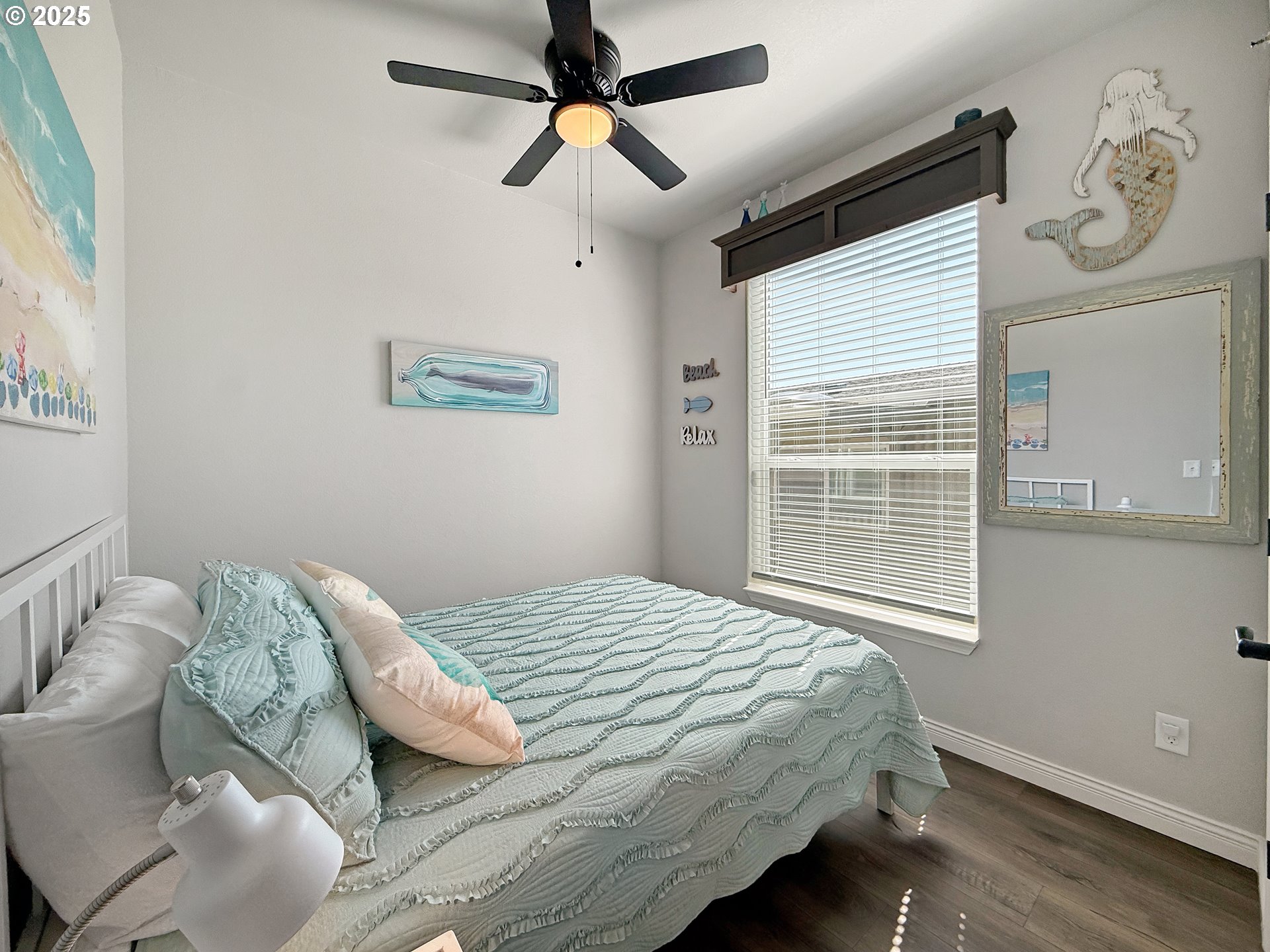 15889 Sunset Strip, Unit 44 Brookings, OR 97415 - Photo 22 of 44 a bedroom with a bed and a window