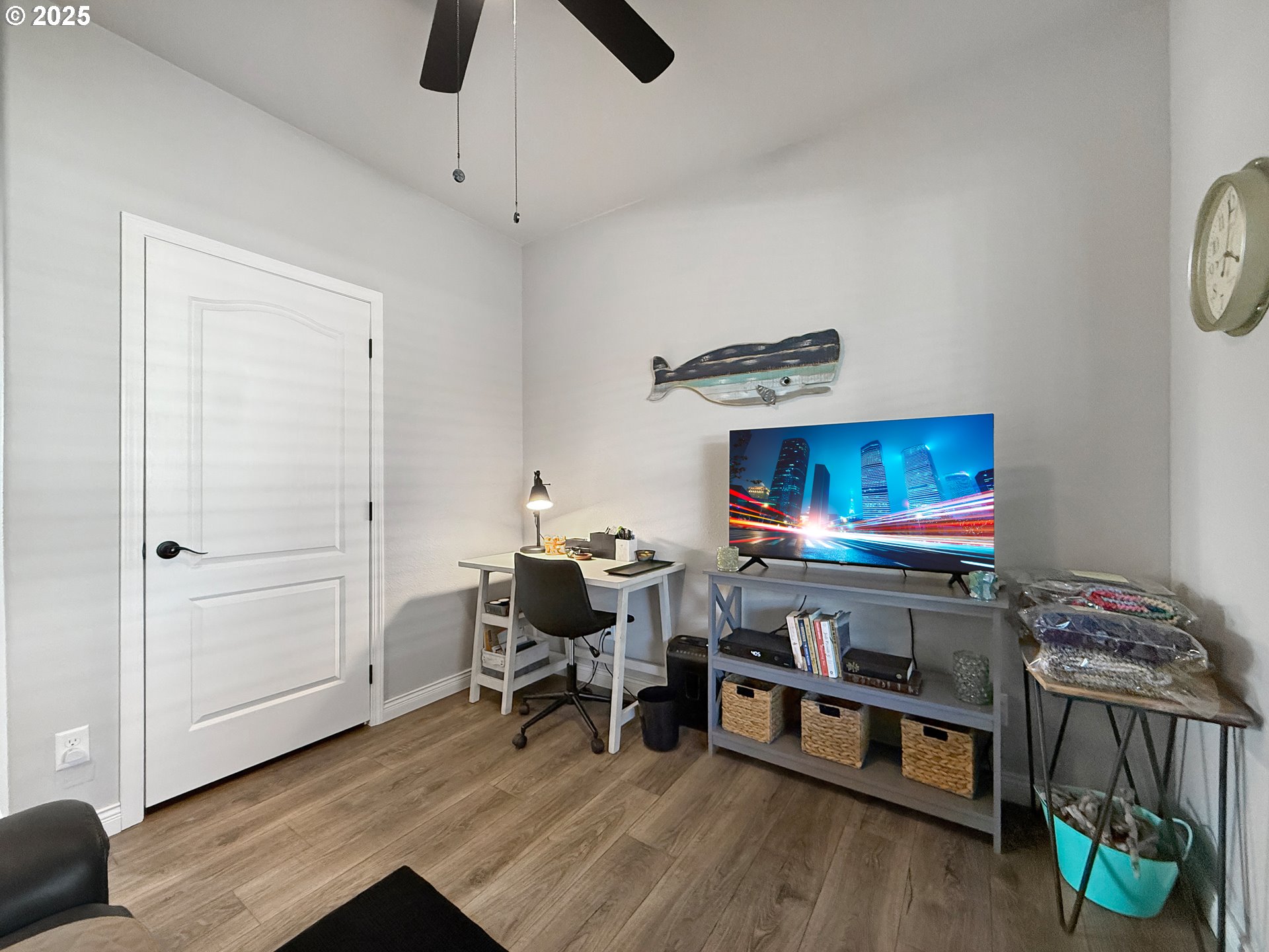 15889 Sunset Strip, Unit 44 Brookings, OR 97415 - Photo 28 of 44 a living room with furniture and a wooden floor