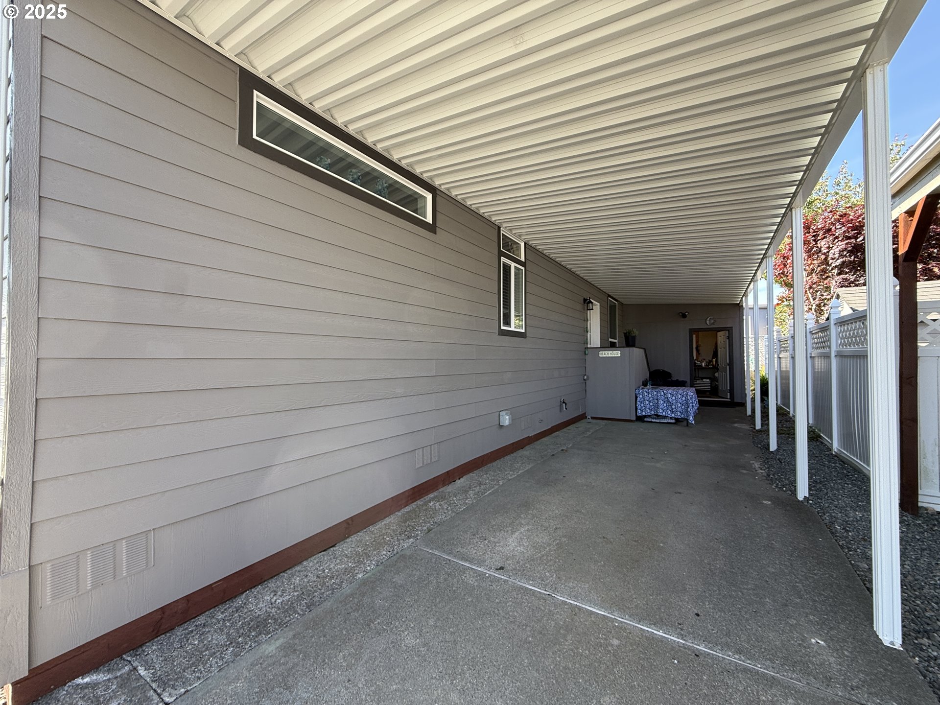 15889 Sunset Strip, Unit 44 Brookings, OR 97415 - Photo 42 of 44 a view of a garage