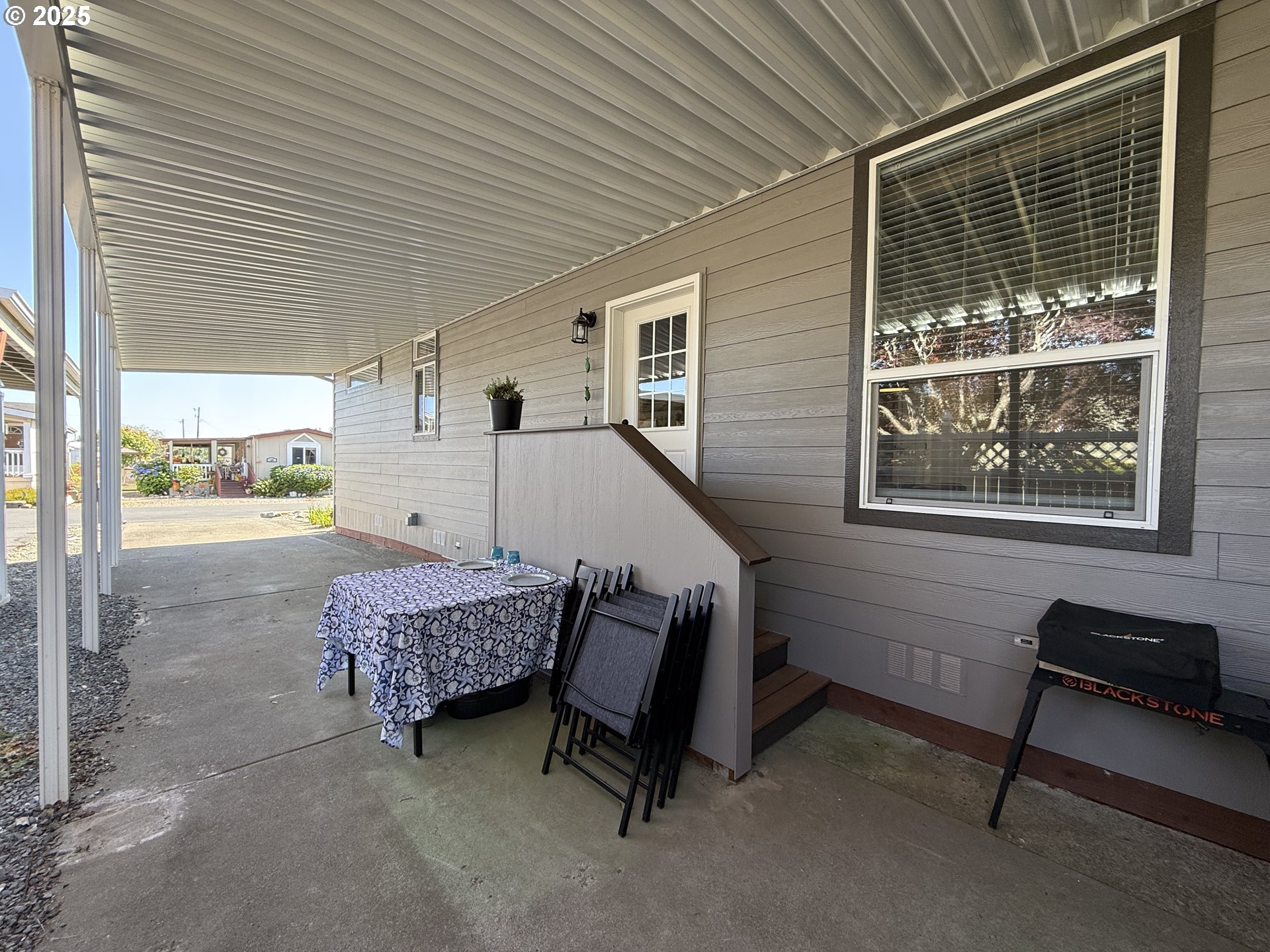 15889 Sunset Strip, Unit 44 Brookings, OR 97415 - Photo 43 of 44 a room with furniture and a window