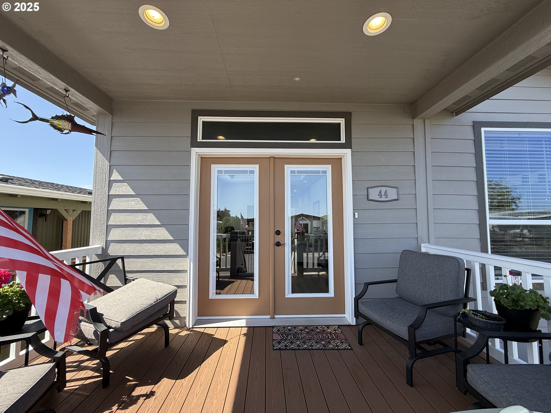 15889 Sunset Strip, Unit 44 Brookings, OR 97415 - Photo 5 of 44 a outdoor living space with furniture and a potted plant