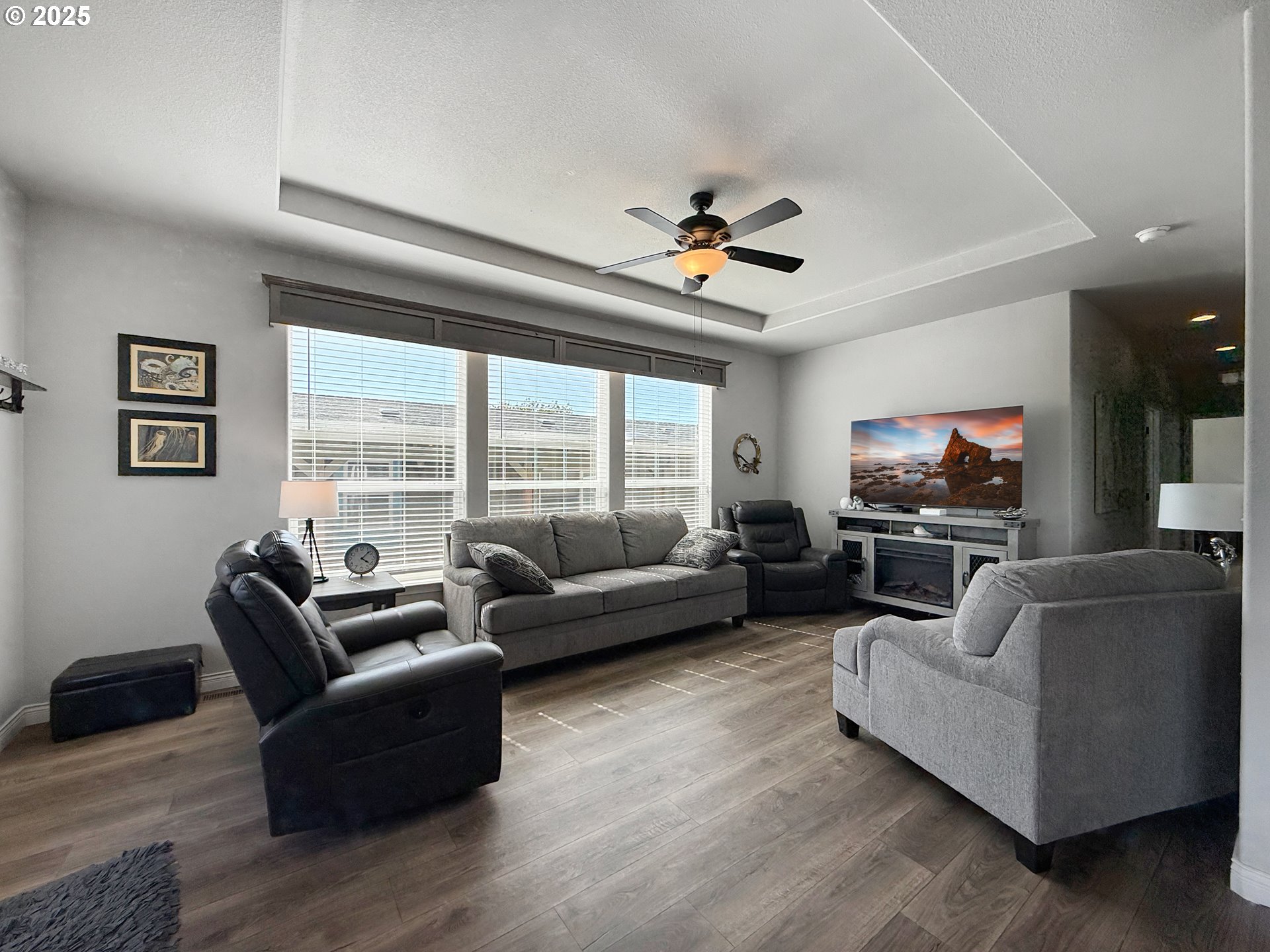 15889 Sunset Strip, Unit 44 Brookings, OR 97415 - Photo 8 of 44 a living room with furniture and a flat screen tv