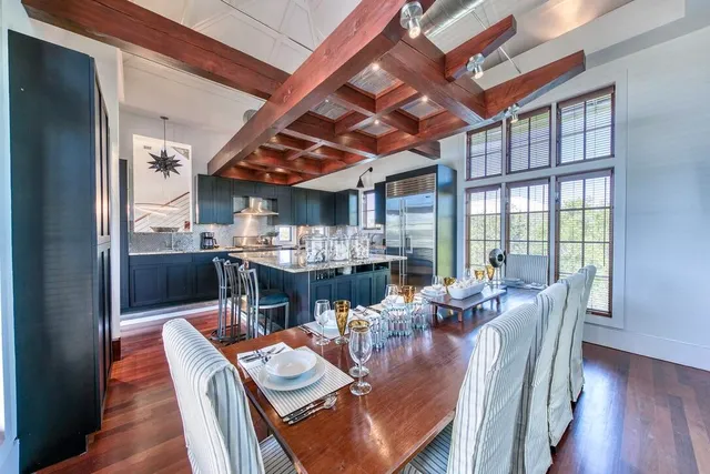 a view of a dining room with furniture window and outside view