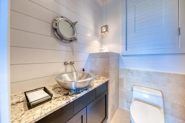 a bathroom with a toilet and a sink