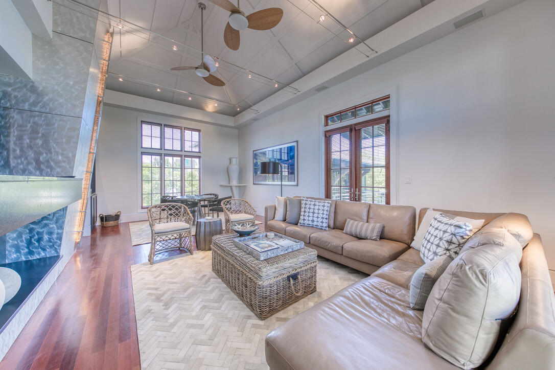 210 Village Way Panama City Beach, FL 32413 - Photo 25 of 56 a living room with furniture and a large window