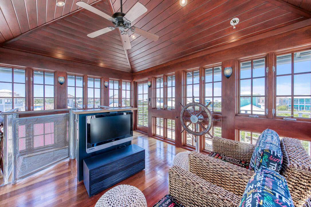 210 Village Way Panama City Beach, FL 32413 - Photo 28 of 56 a living room with furniture and a flat screen tv