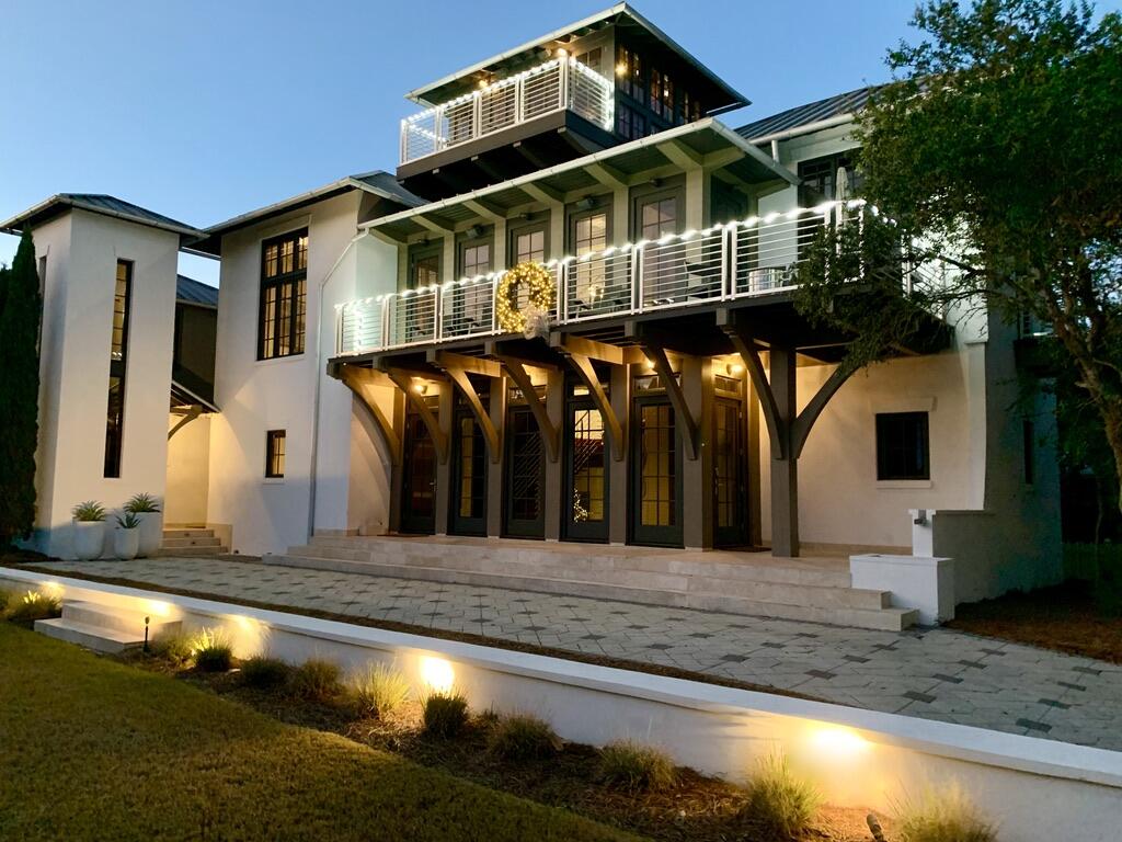 210 Village Way Panama City Beach, FL 32413 - Photo 3 of 56 a front view of a house with swimming pool