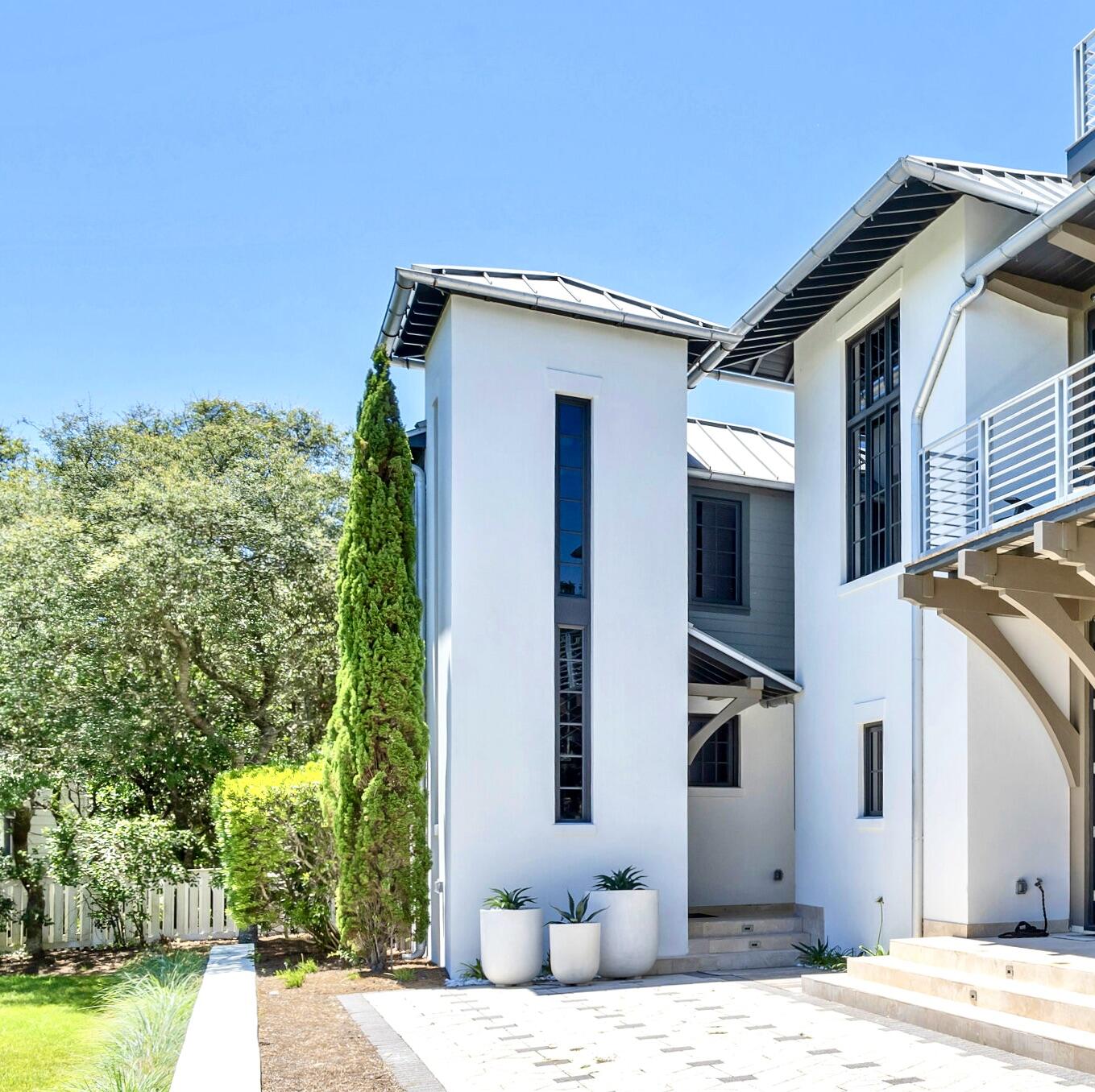 210 Village Way Panama City Beach, FL 32413 - Photo 32 of 56 a front view of a house with a yard