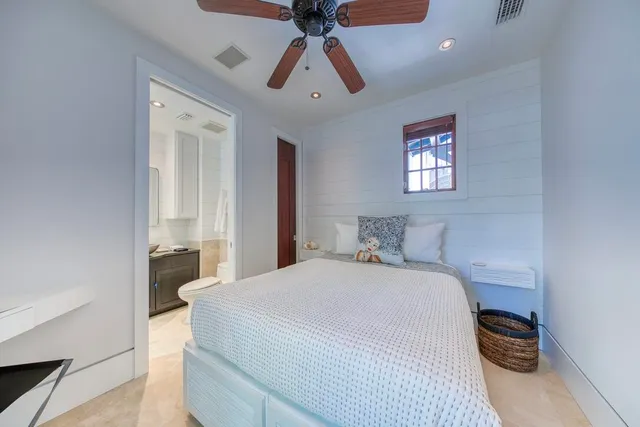 an aerial view of multiple houses with yard