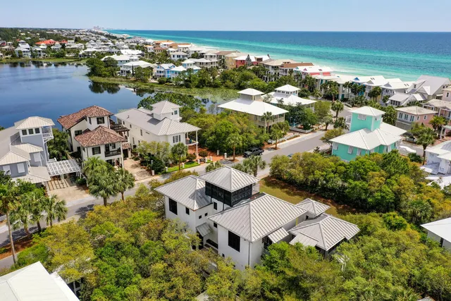 a view of a chairs and table in the patio