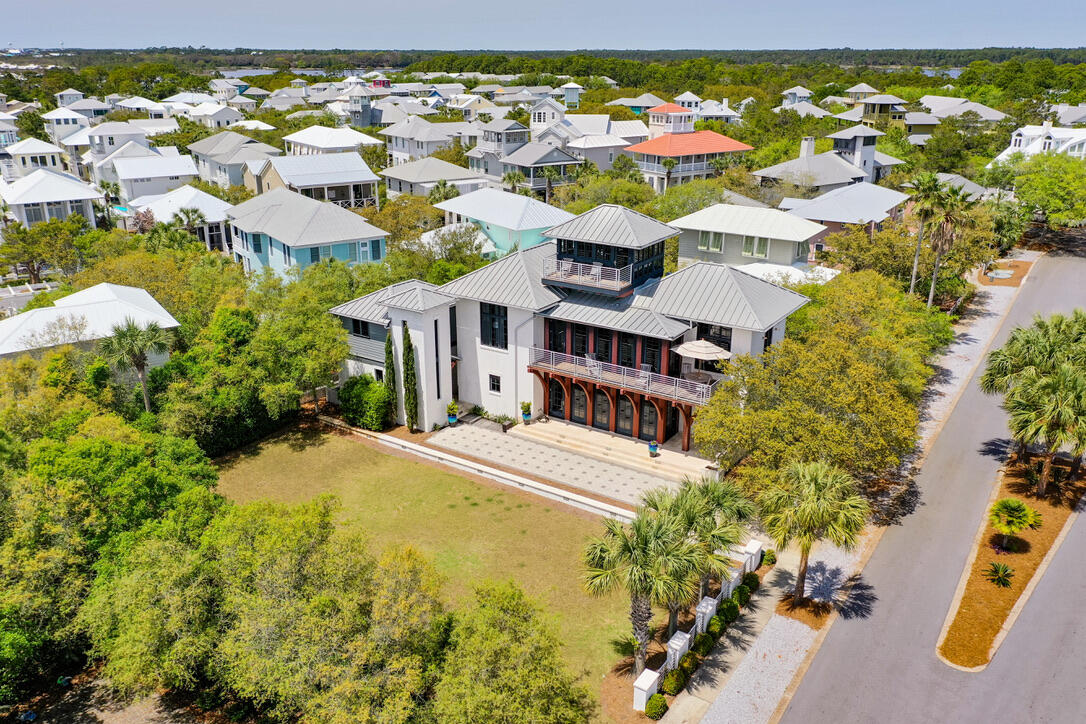 210 Village Way Panama City Beach, FL 32413 - Photo 44 of 56 an aerial view of residential houses with outdoor space and swimming pool