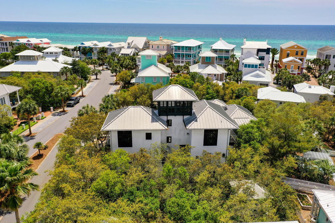 210 Village Way Panama City Beach, FL 32413 - Photo 45 of 56 an aerial view of a house with yard and ocean view