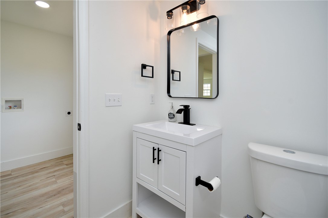 407 I Street Anderson, SC 29625 - Photo 21 of 43 Modern fixtures enhance this clean, bright bathroom space, perfect for daily routines.