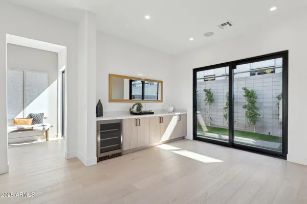 a bathroom with a double vanity sink toilet and shower