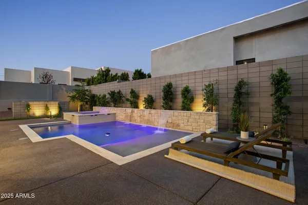 a view of an outdoor sitting area with furniture
