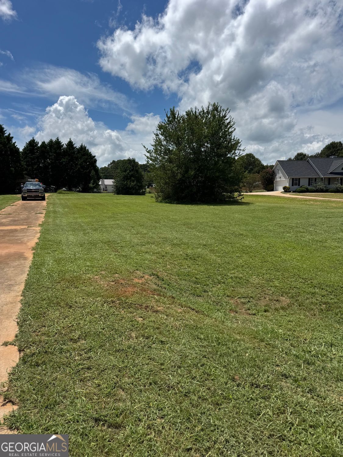 121 Wilder Way Williamson, GA 30292 - Photo 3 of 3 a view of a field with an ocean