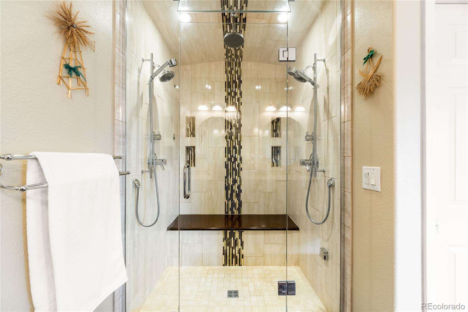 2013 Trail Ridge Drive Severance, CO 80615 - Photo 22 of 49 a bathroom with a shower