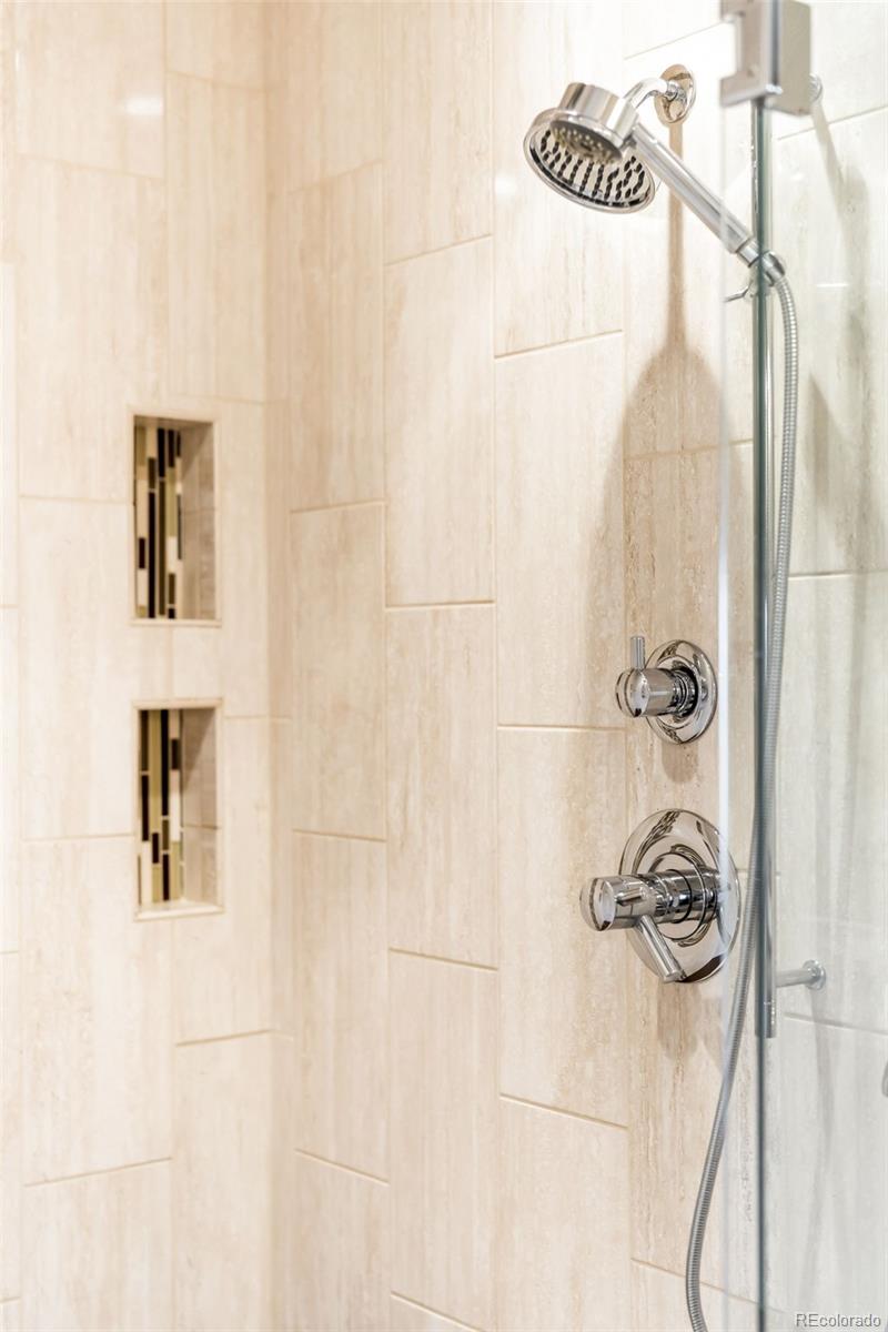 2013 Trail Ridge Drive Severance, CO 80615 - Photo 23 of 49 a bathroom with a shower