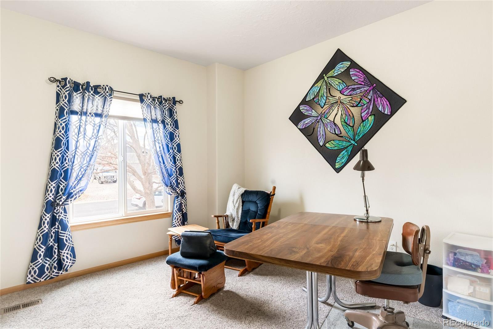 2013 Trail Ridge Drive Severance, CO 80615 - Photo 27 of 49 a workspace with furniture and window