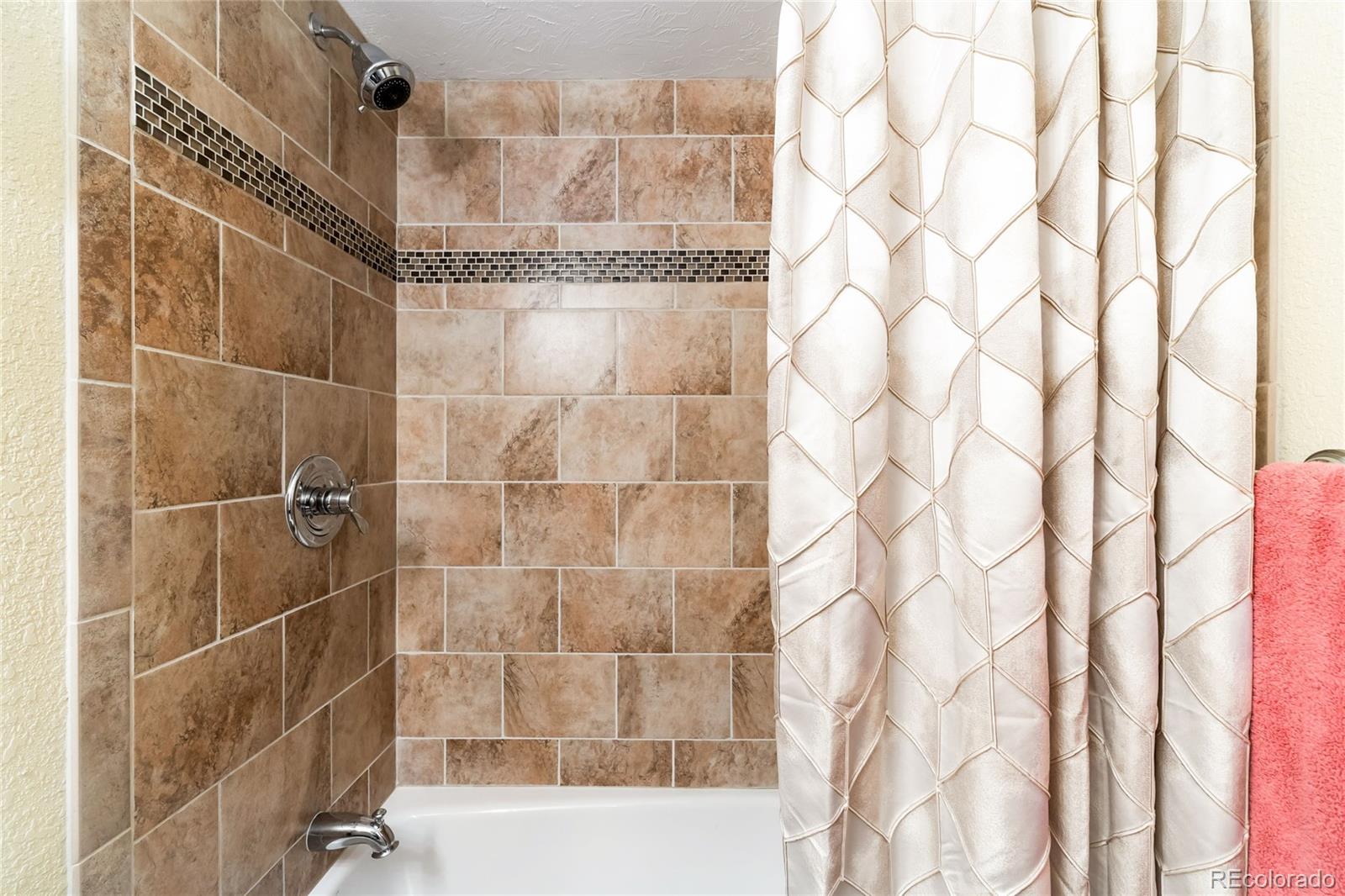 2013 Trail Ridge Drive Severance, CO 80615 - Photo 32 of 49 a bathroom with a shower