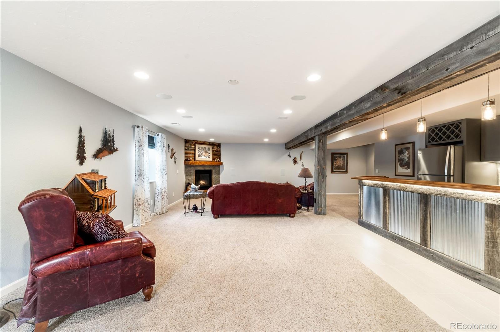 2013 Trail Ridge Drive Severance, CO 80615 - Photo 33 of 49 a living room with furniture and a table