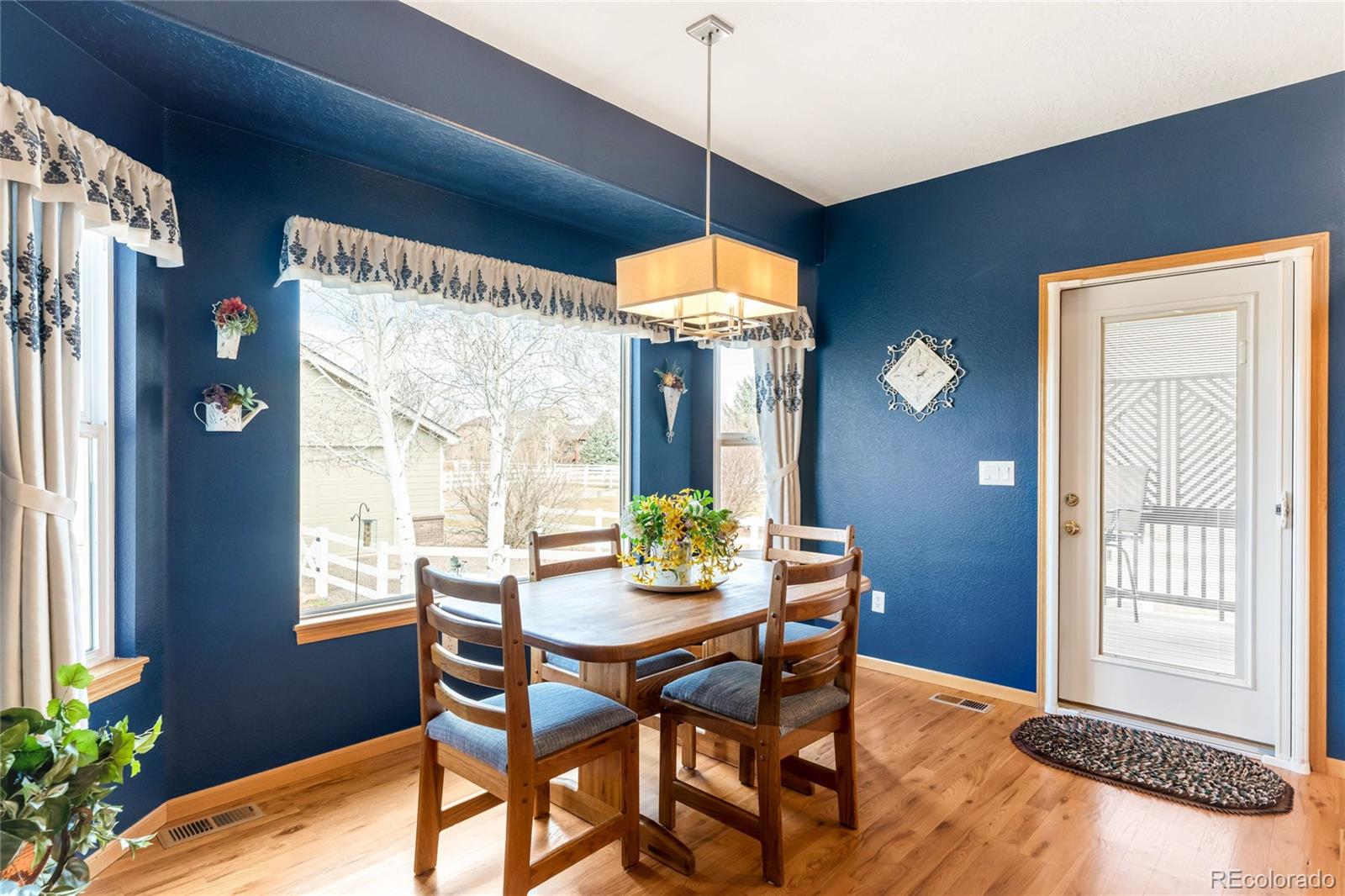 2013 Trail Ridge Drive Severance, CO 80615 - Photo 9 of 49 a dining room with furniture and window