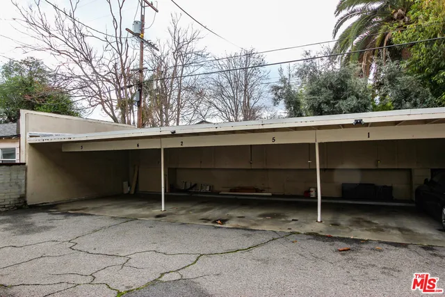 a view of a car garage and wall