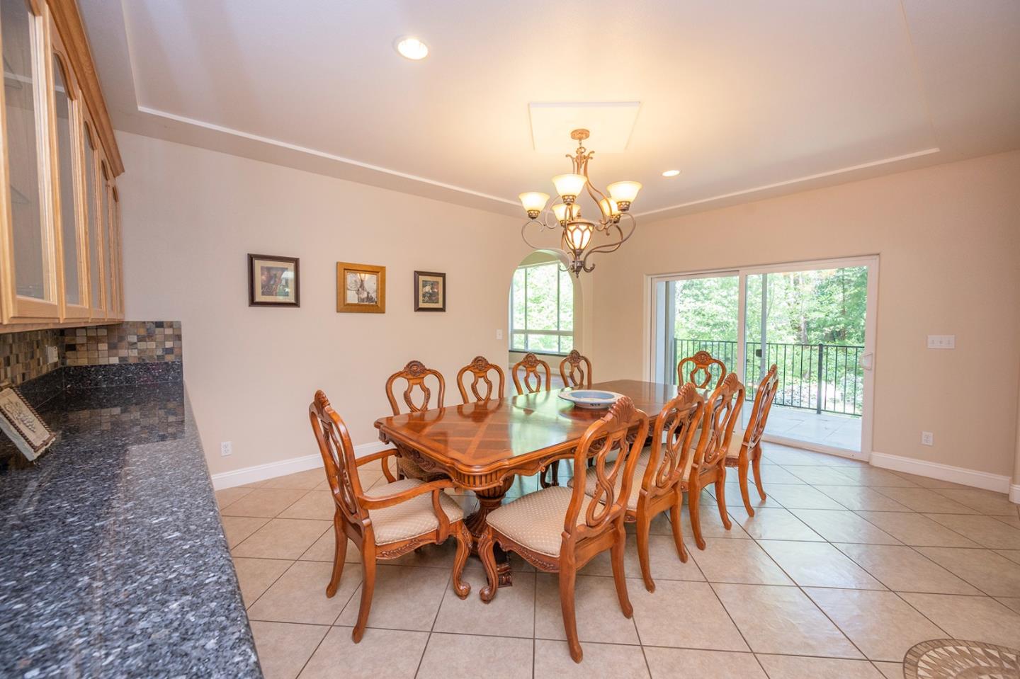 2271 Murphys Drive Arnold, CA 95223 - Photo 24 of 91 a view of a dining room with furniture and a chandelier