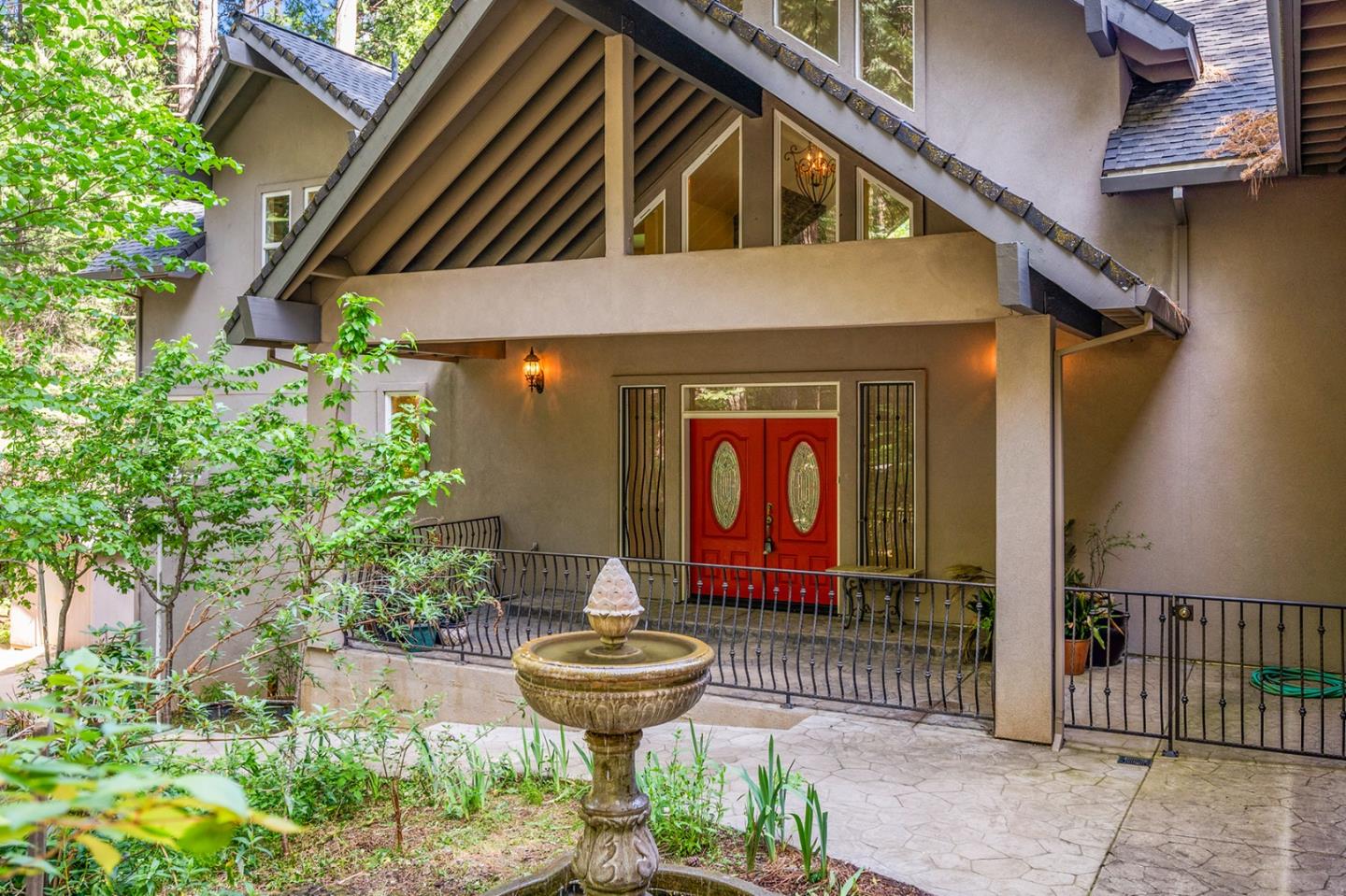 2271 Murphys Drive Arnold, CA 95223 - Photo 5 of 91 a front view of a house with garden