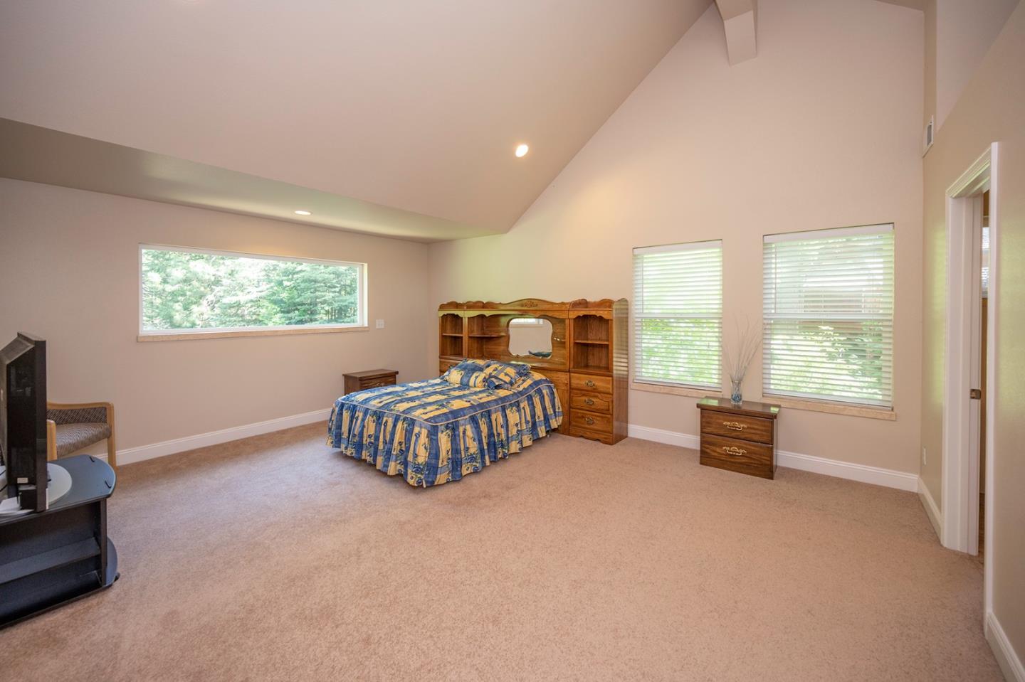 2271 Murphys Drive Arnold, CA 95223 - Photo 59 of 91 a bedroom with a bed and a tv