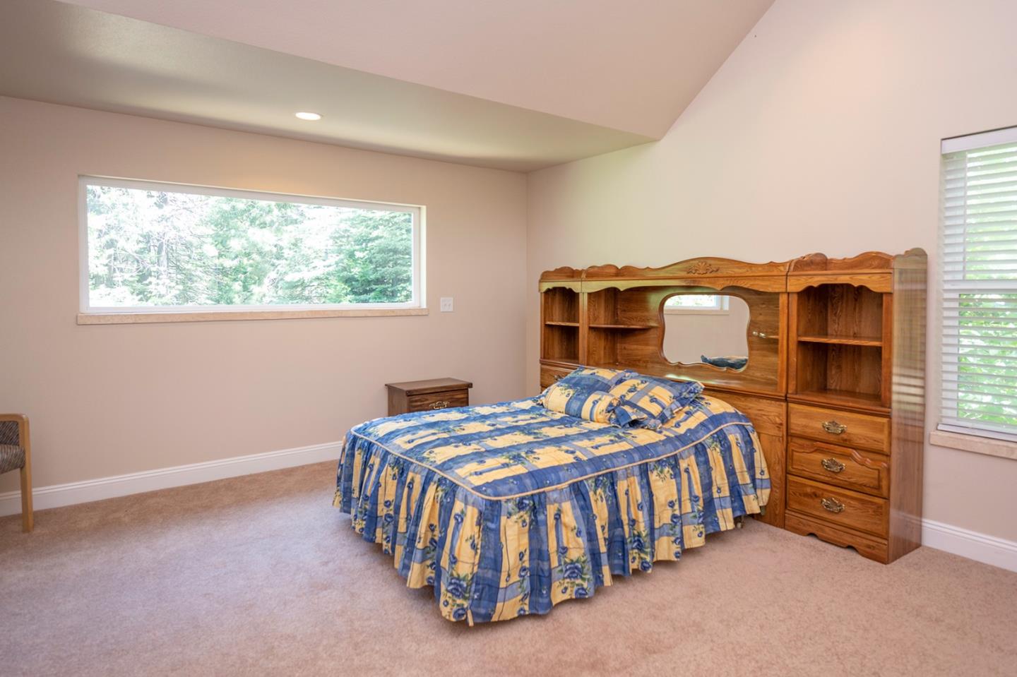 2271 Murphys Drive Arnold, CA 95223 - Photo 60 of 91 a bedroom with a bed table and a window